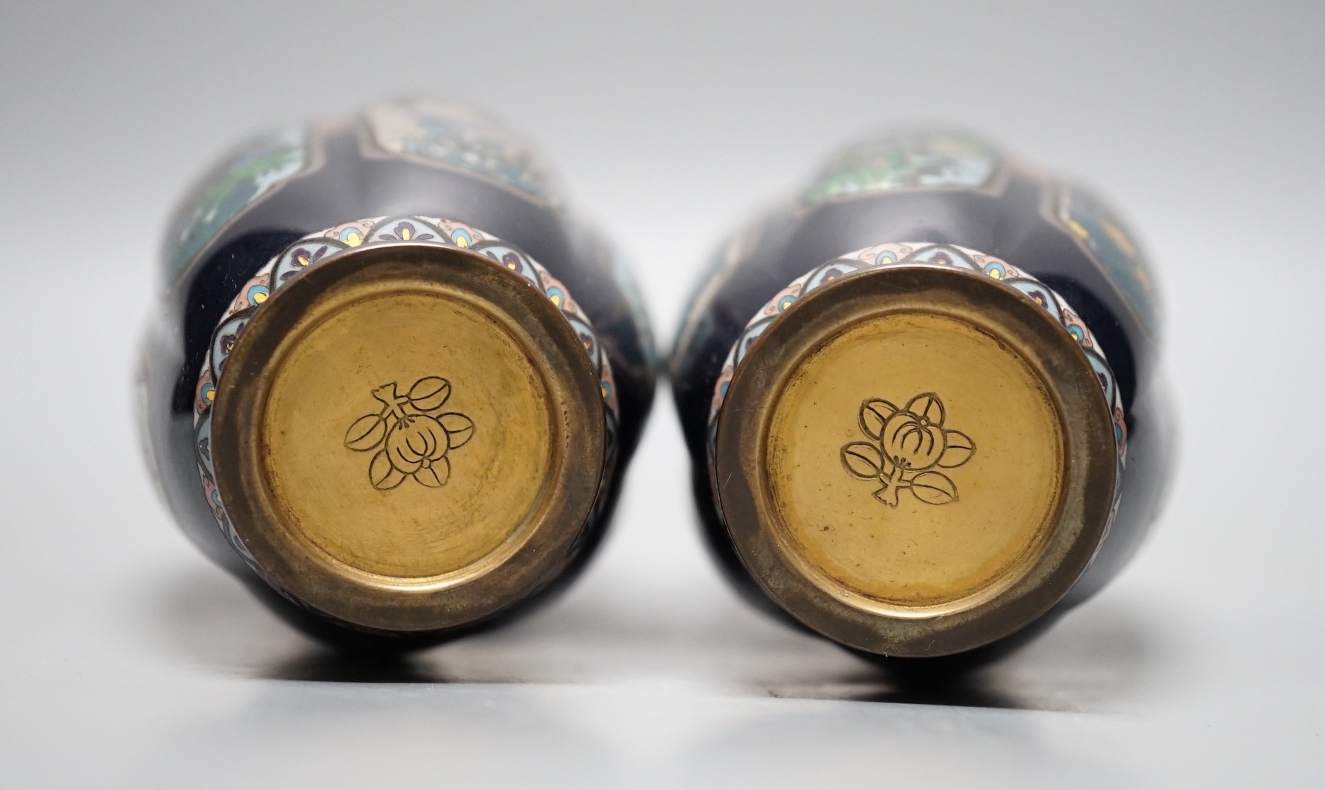 A pair of Meiji period Japanese silver wire cloisonne enamel vases, 15cm tall